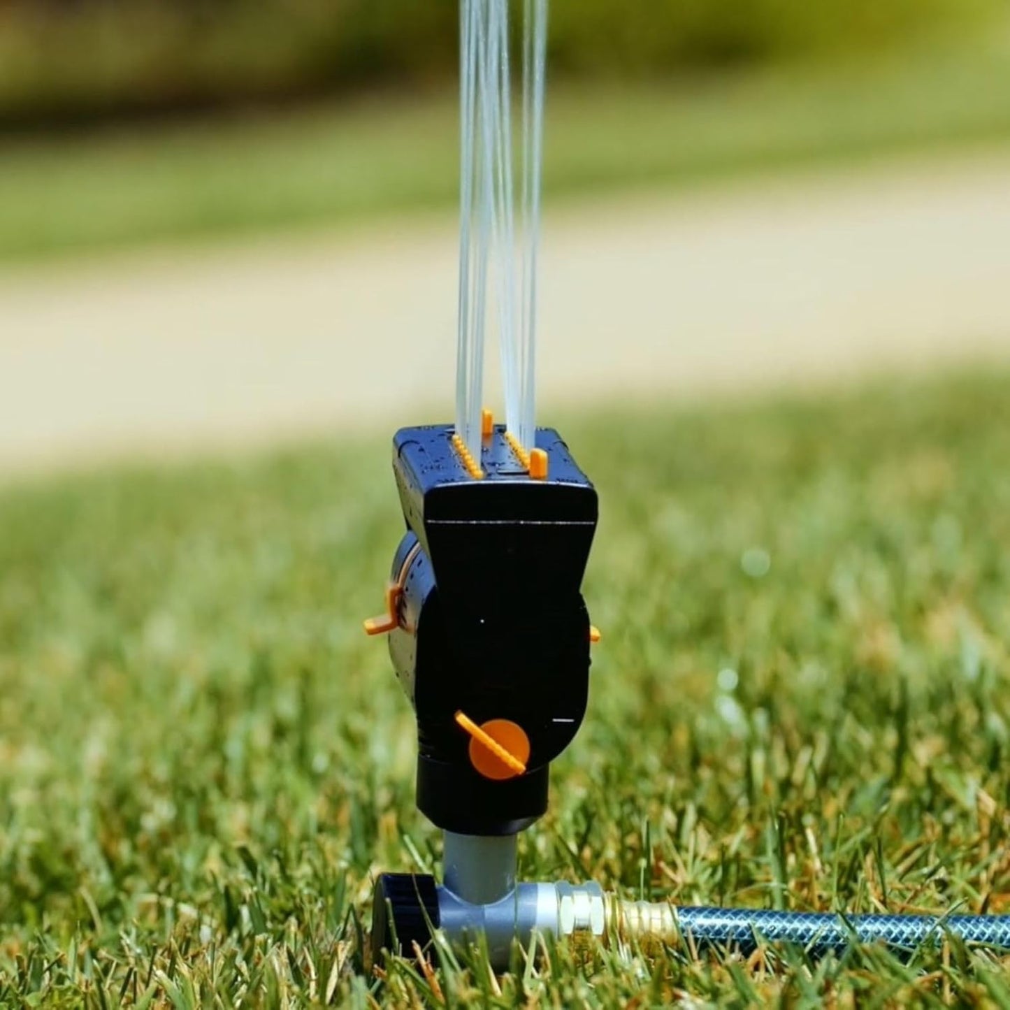 Melnor 65137AMZ MiniMax Turbo Oscillating Sprinkler on Step Spike, 4000 sq. ft., 4-Way Adjustable, Quick Connect Bundle, Yellow